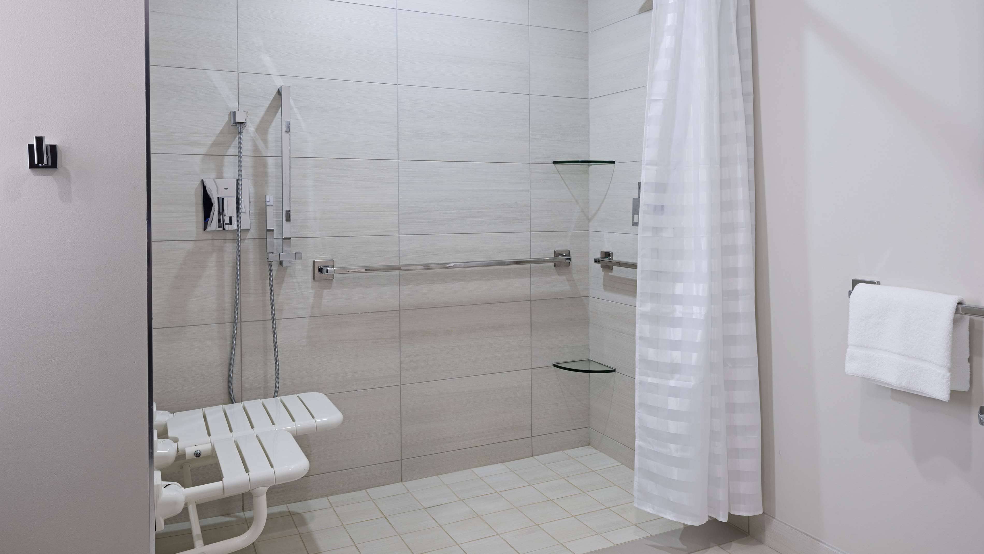 eco-friendly toiletries, hair dryer, towels