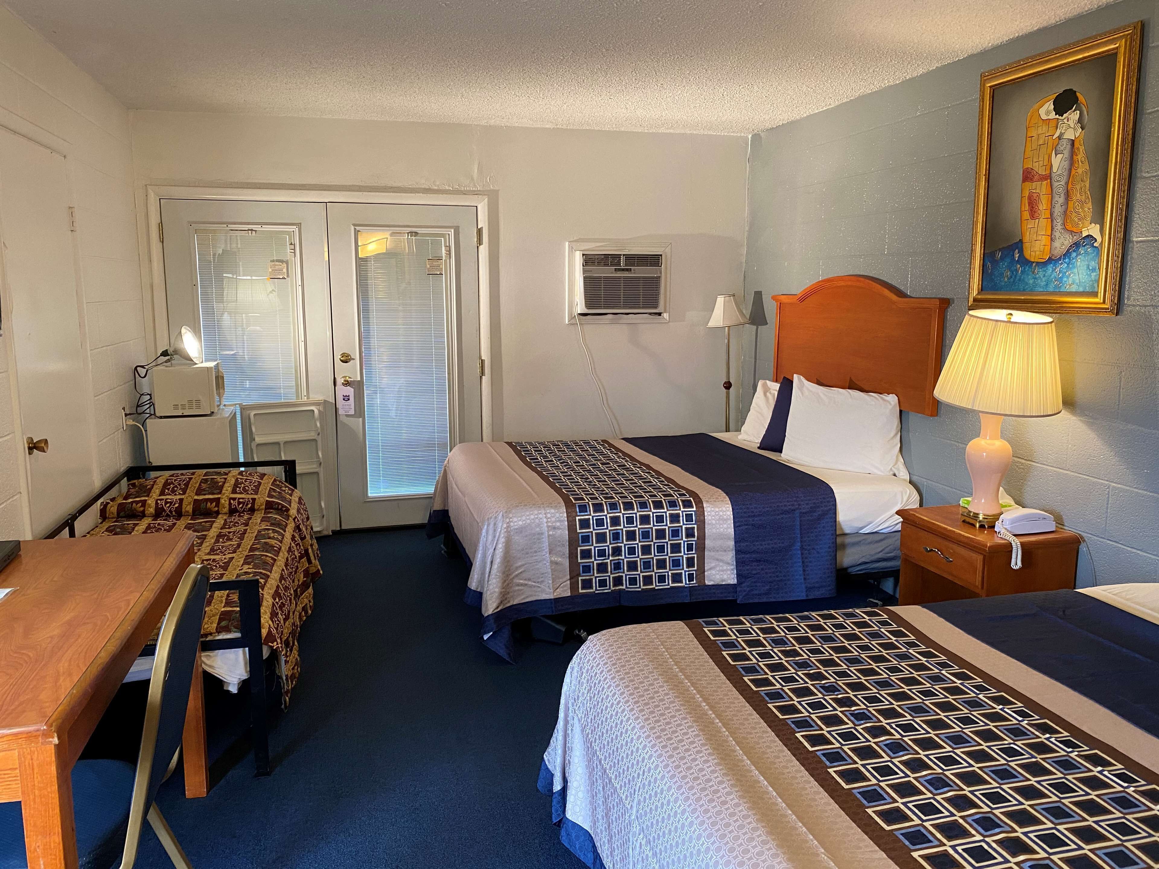 room, 2 queen beds | desk, iron/ironing board, free wifi, bed sheets