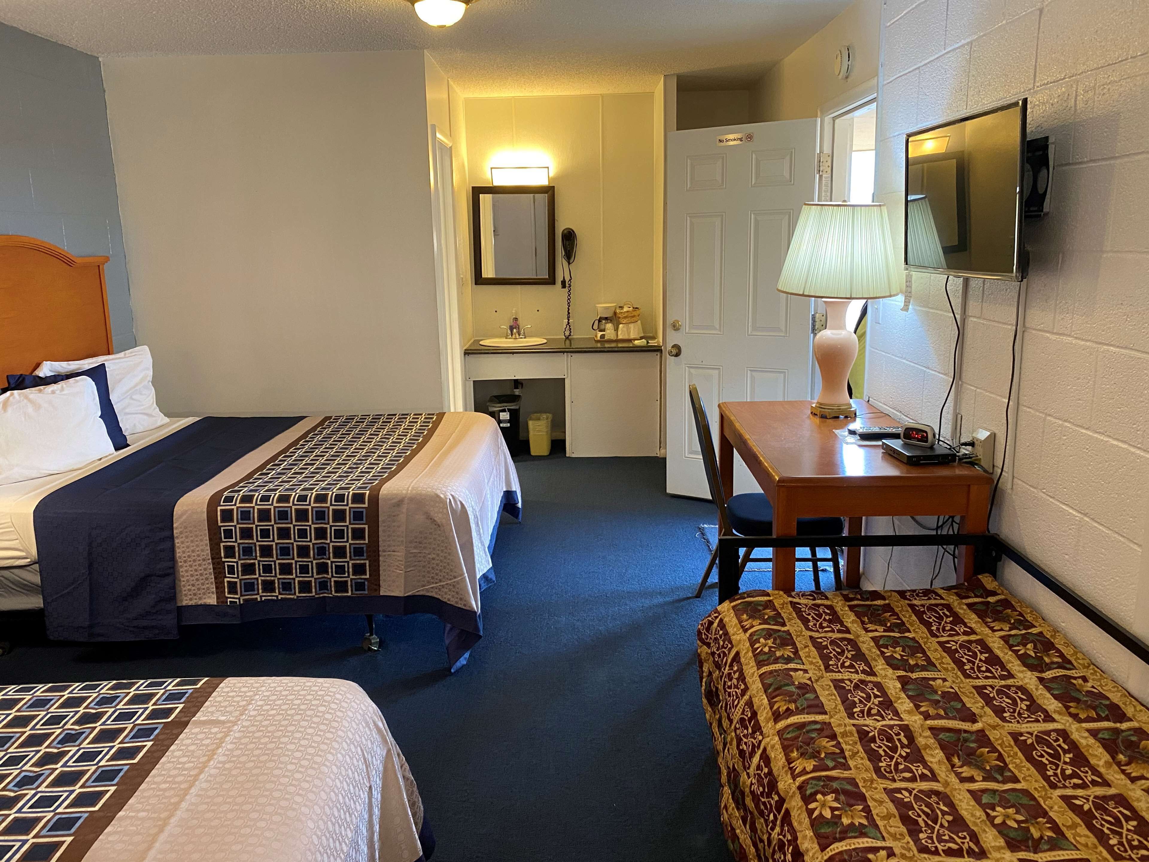 room, 2 queen beds | desk, iron/ironing board, free wifi, bed sheets