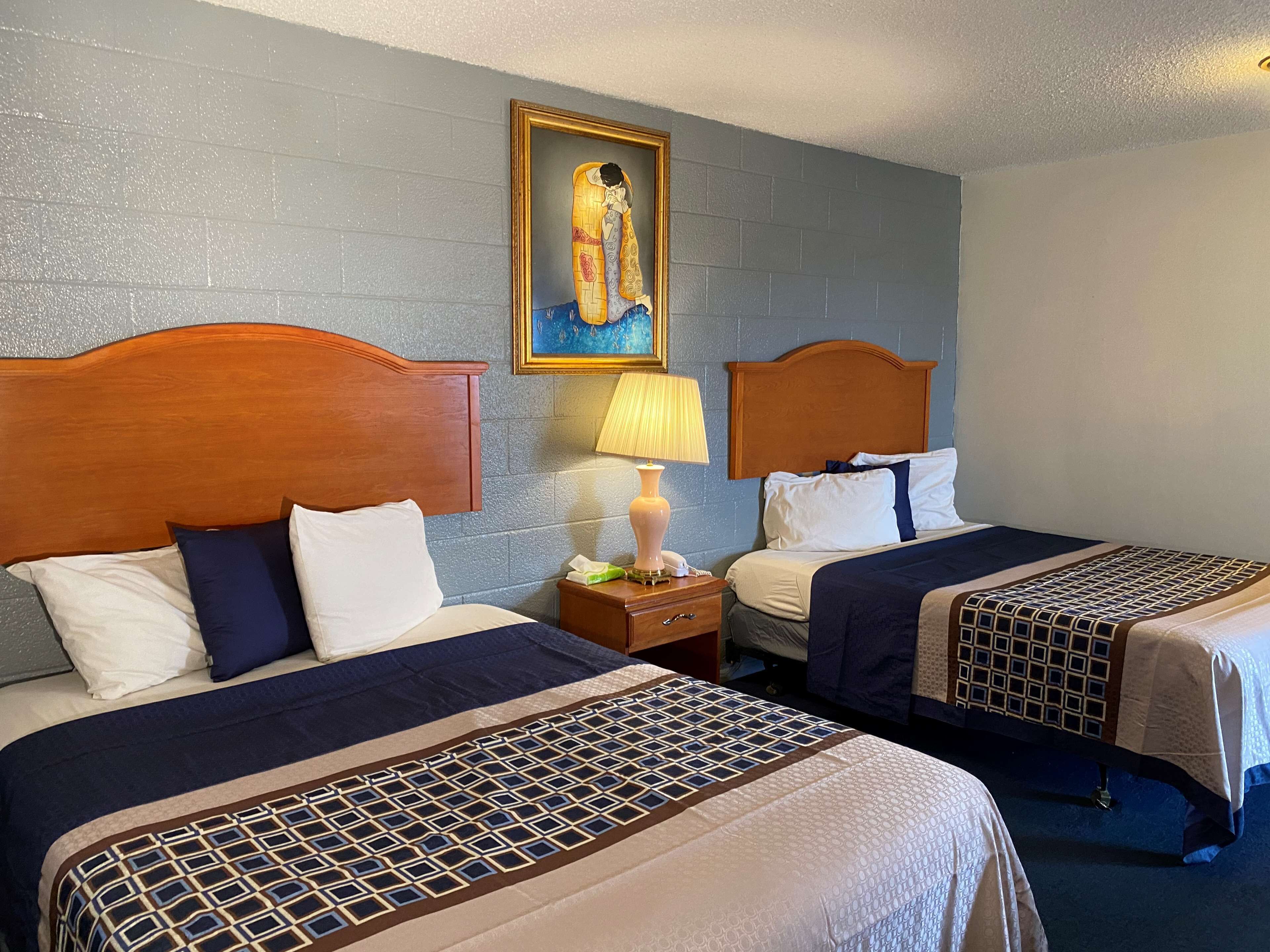 room, 2 queen beds | desk, iron/ironing board, free wifi, bed sheets