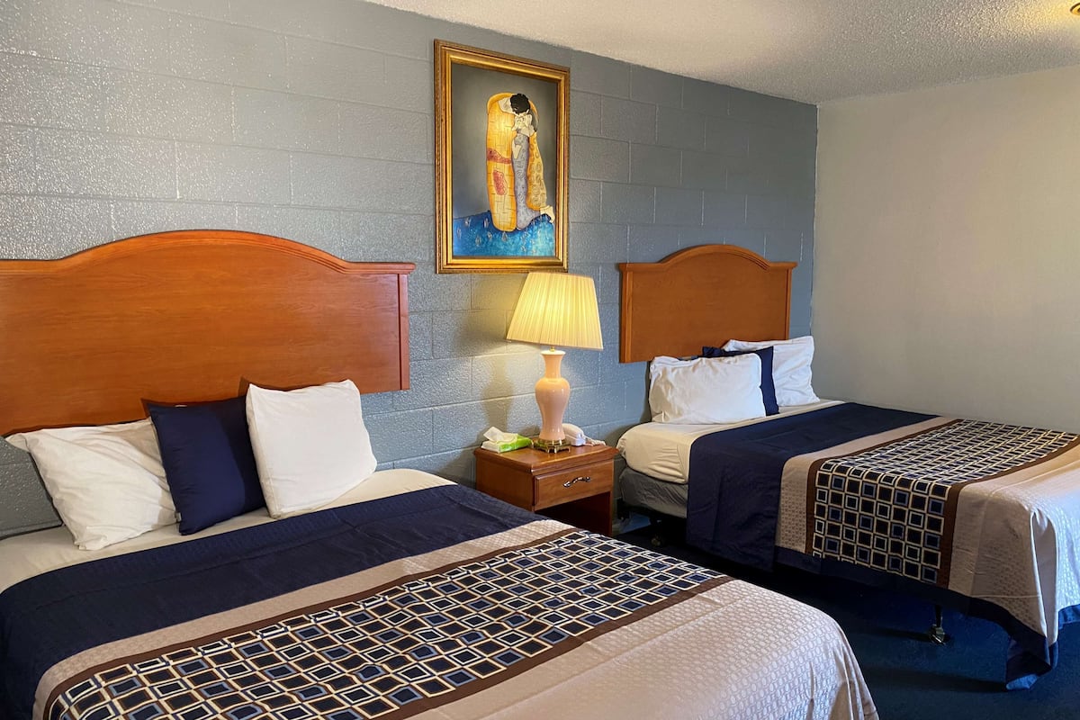 room, 2 queen beds | desk, iron/ironing board, free wifi, bed sheets