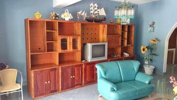 Villa, 4 Bedrooms | Living area | -32-inch flat-screen TV with cable channels, TV