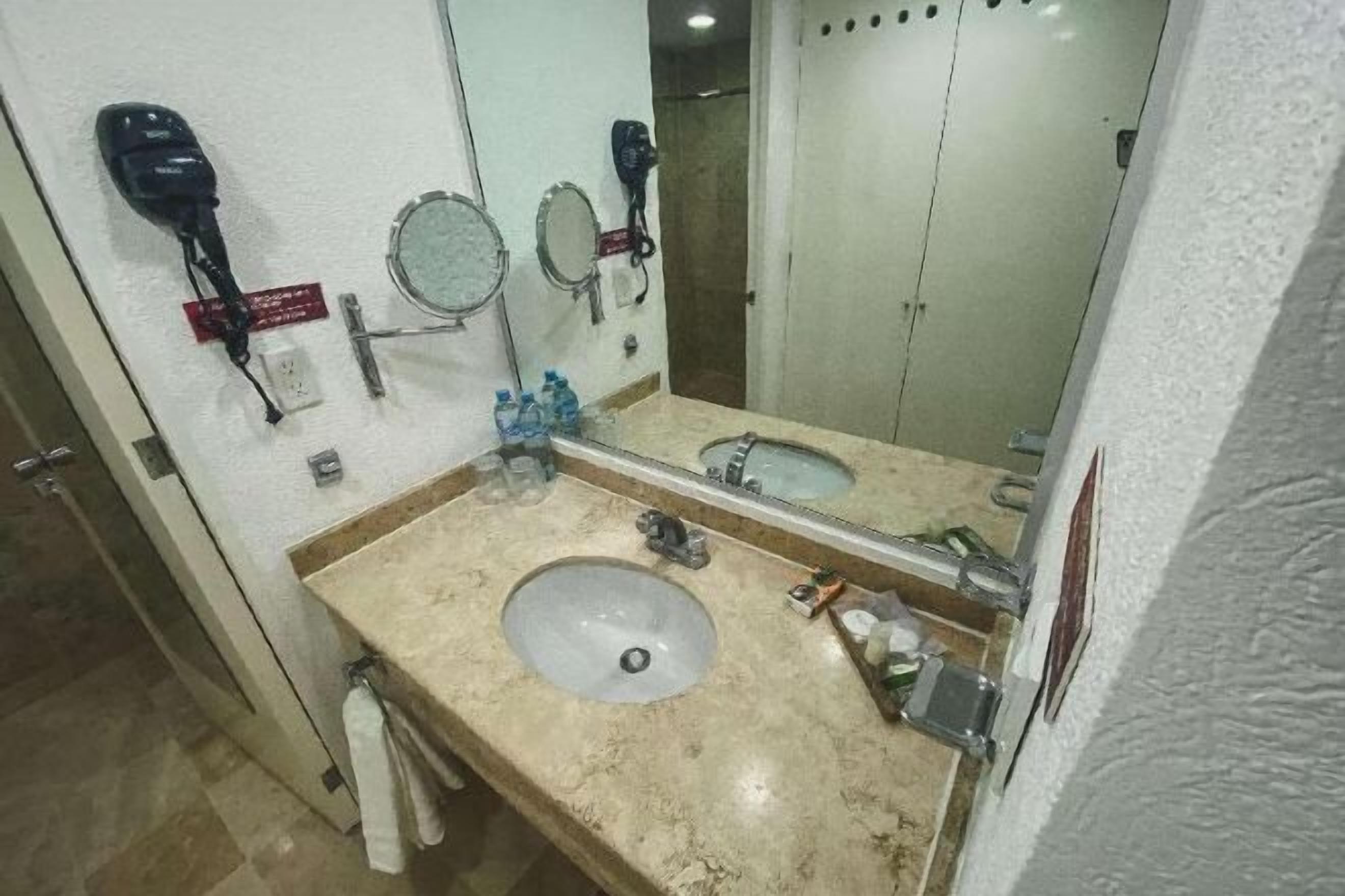 Bathroom | Shower, designer toiletries, hair dryer, towels