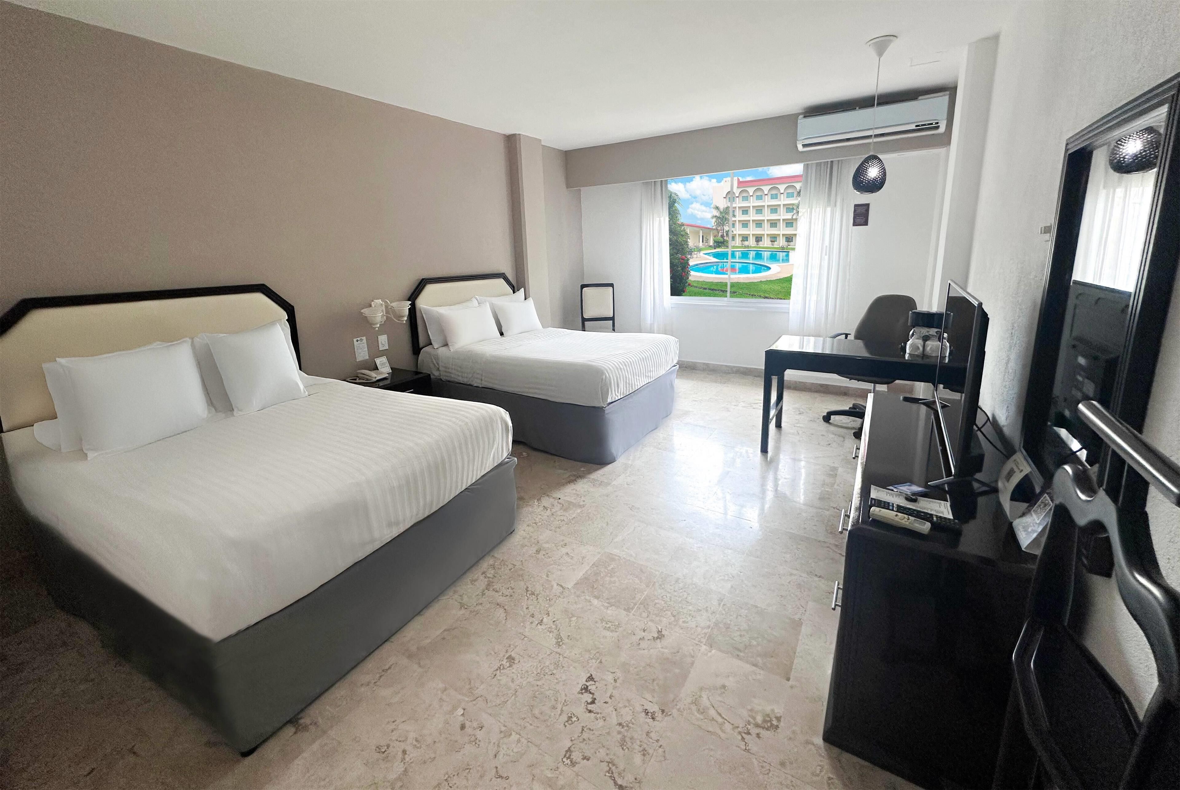 Room, 2 Double Beds, Non Smoking | In-room safe, laptop workspace, blackout drapes, iron/ironing board