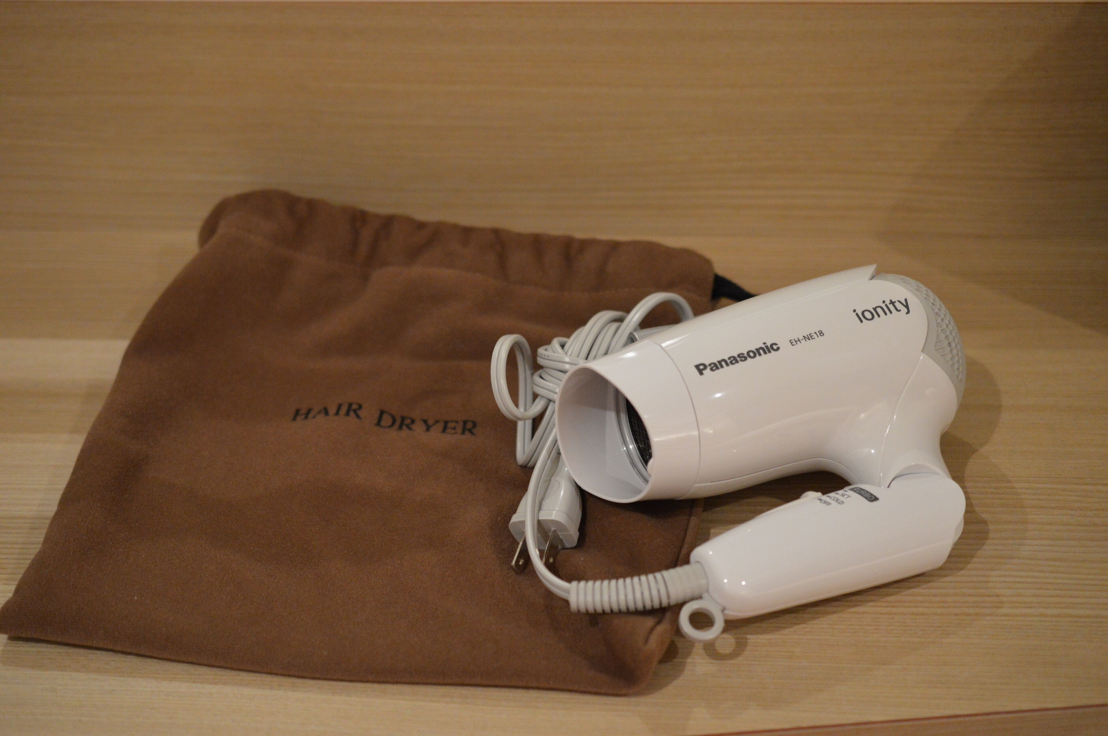 combined shower/bathtub, free toiletries, hair dryer, slippers