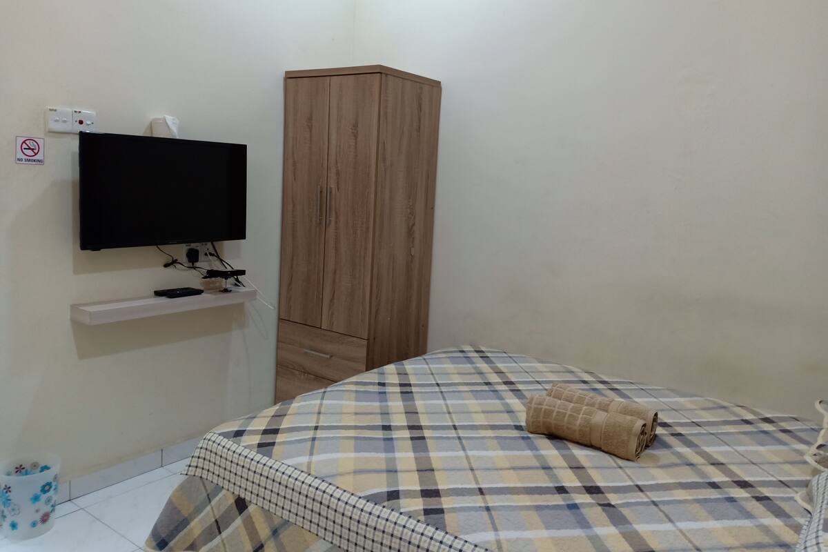 Premium bedding, memory-foam beds, iron/ironing board, free WiFi