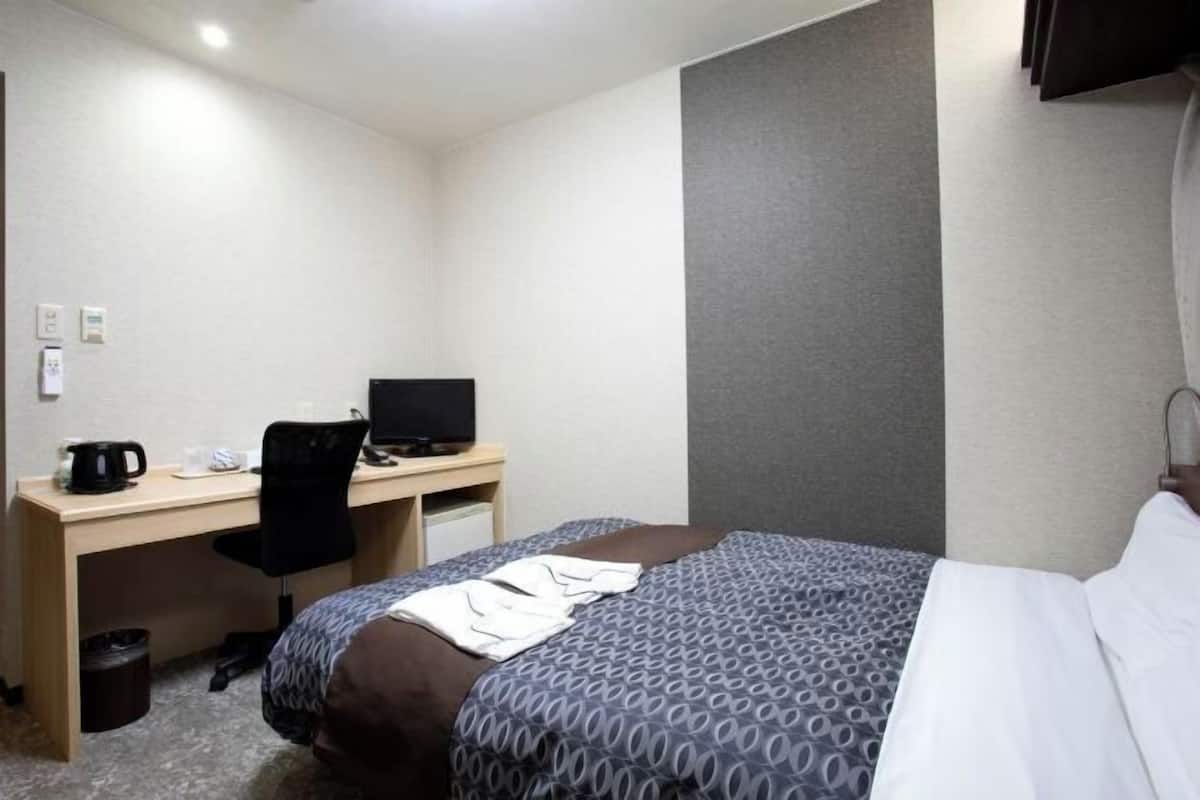 Blackout drapes, iron/ironing board, free WiFi, bed sheets