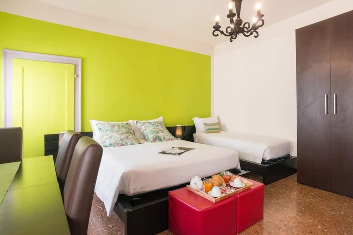 Quadruple Room | In-room safe, cribs (surcharge), rollaway beds (surcharge), WiFi (free)