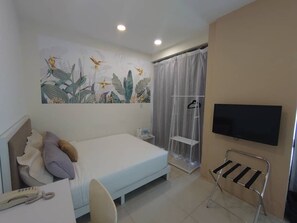 Premium Deluxe Room with Window | Desk, iron/ironing board, free WiFi, bed sheets