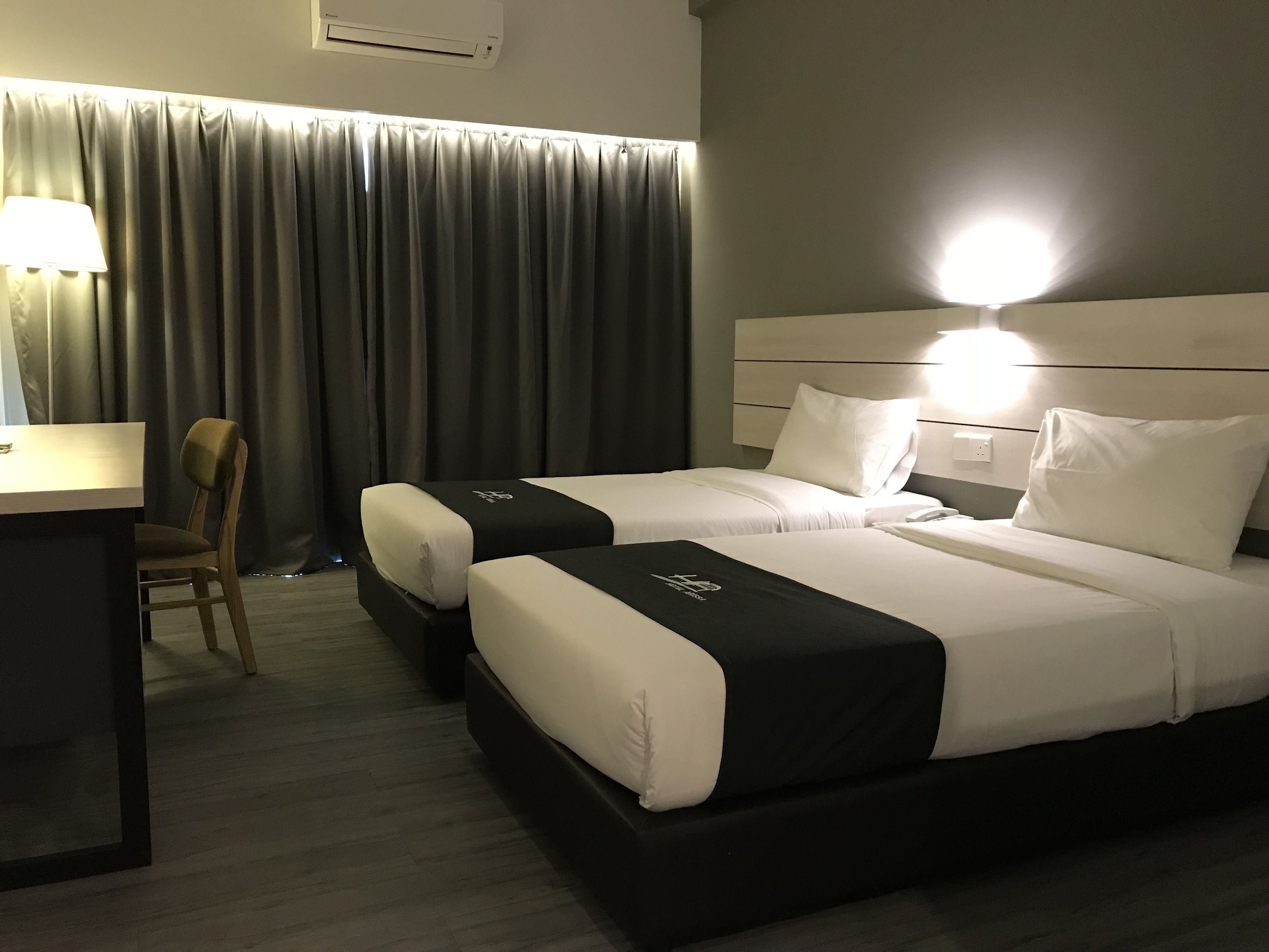 junior twin room | minibar, in-room safe, desk, blackout curtains