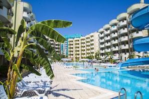 2 outdoor pools, pool umbrellas, pool loungers