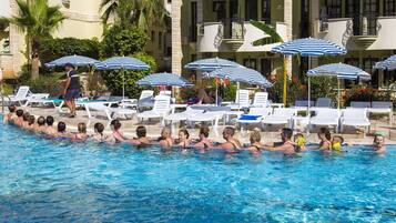 2 outdoor pools, pool umbrellas, pool loungers