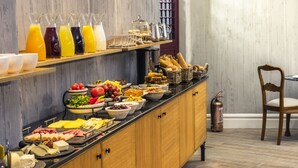 A breakfast buffet with various food items and beverages. - New Bosphorus Hotel (Istanbul)