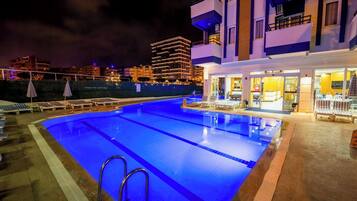 Outdoor pool, open 8:30 AM to 7:00 PM, pool umbrellas, sun loungers