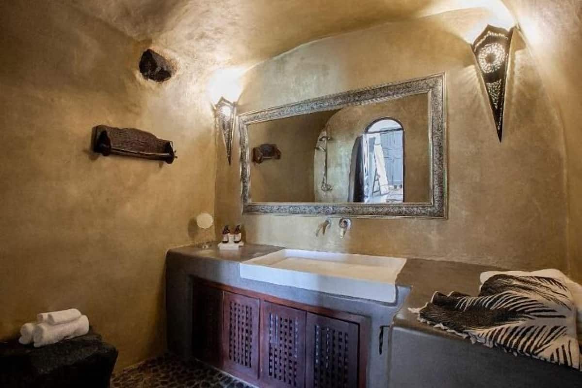 Bathroom | Shower, designer toiletries, hair dryer, bathrobes