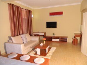 Deluxe Apartment, 2 Bedrooms | Desk, soundproofing, iron/ironing board, free cots/infant beds - Wanasa Hotel Apartments (Muscat)