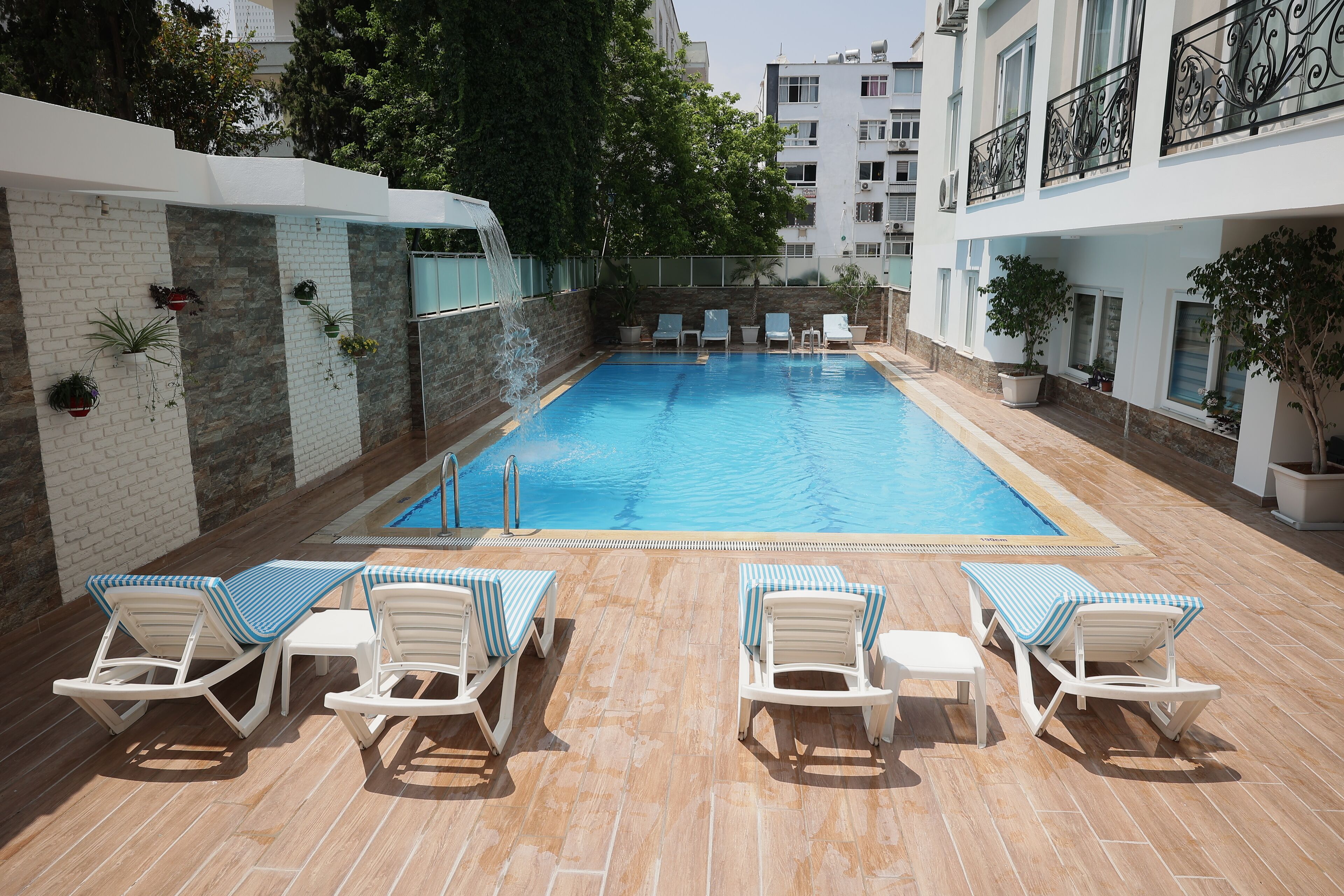 outdoor pool, free pool cabanas, pool umbrellas