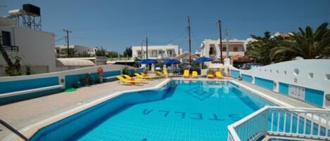 Seasonal outdoor pool, pool umbrellas, sun loungers