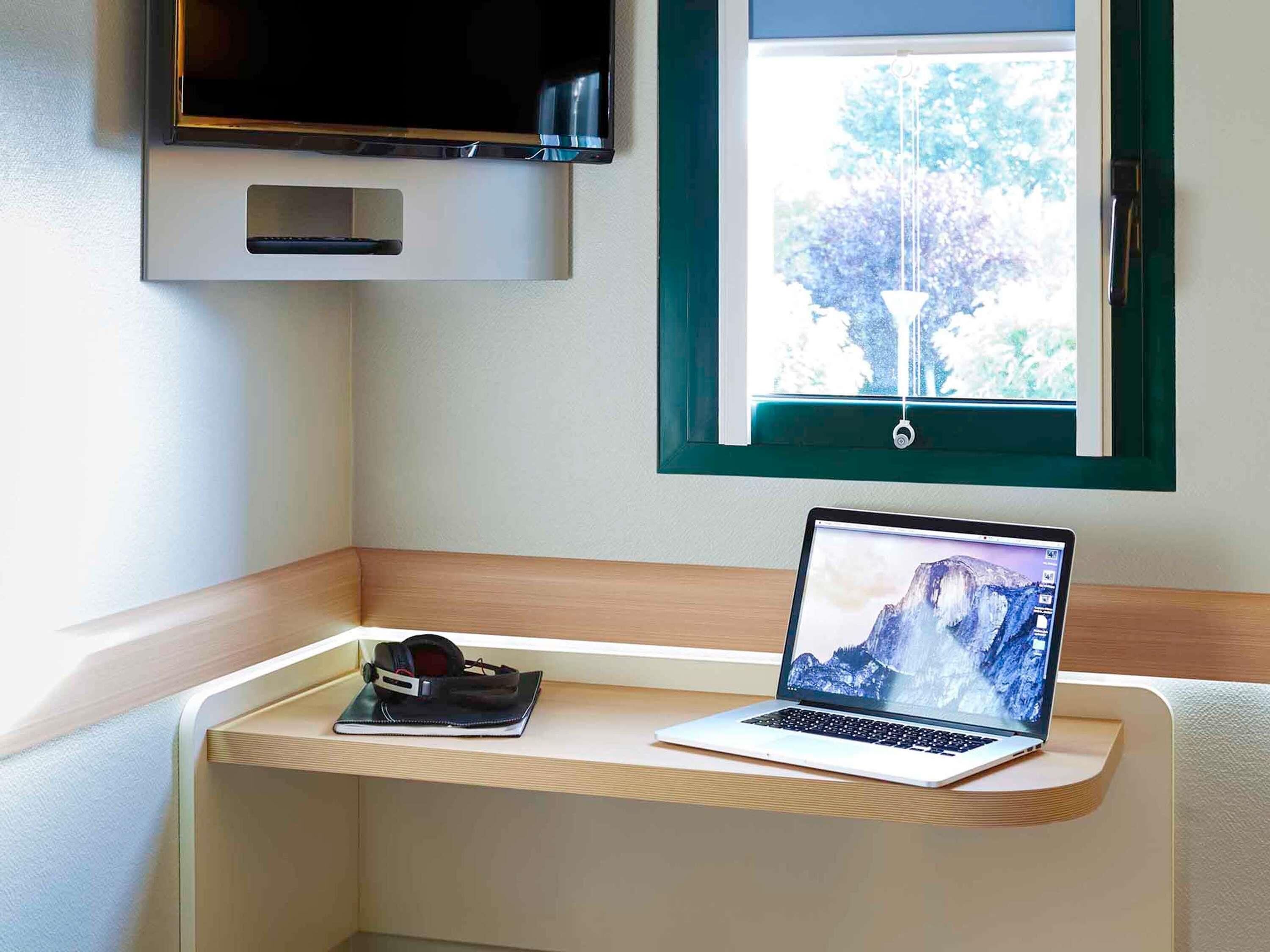 desk, soundproofing, free cots/infant beds, free wifi