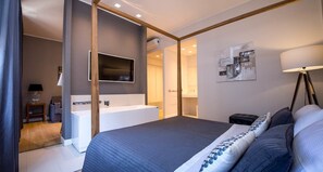 Deluxe Suite | Premium bedding, memory foam beds, in-room safe, individually decorated