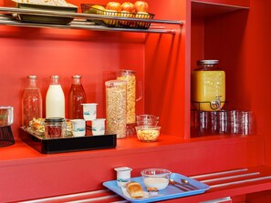 A breakfast buffet with various food items and beverages. - hotelF1 Lorient (Caudan)