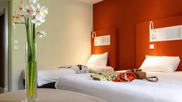 Triple Room, Multiple Beds | Premium bedding, desk, soundproofing, free cots/infant beds