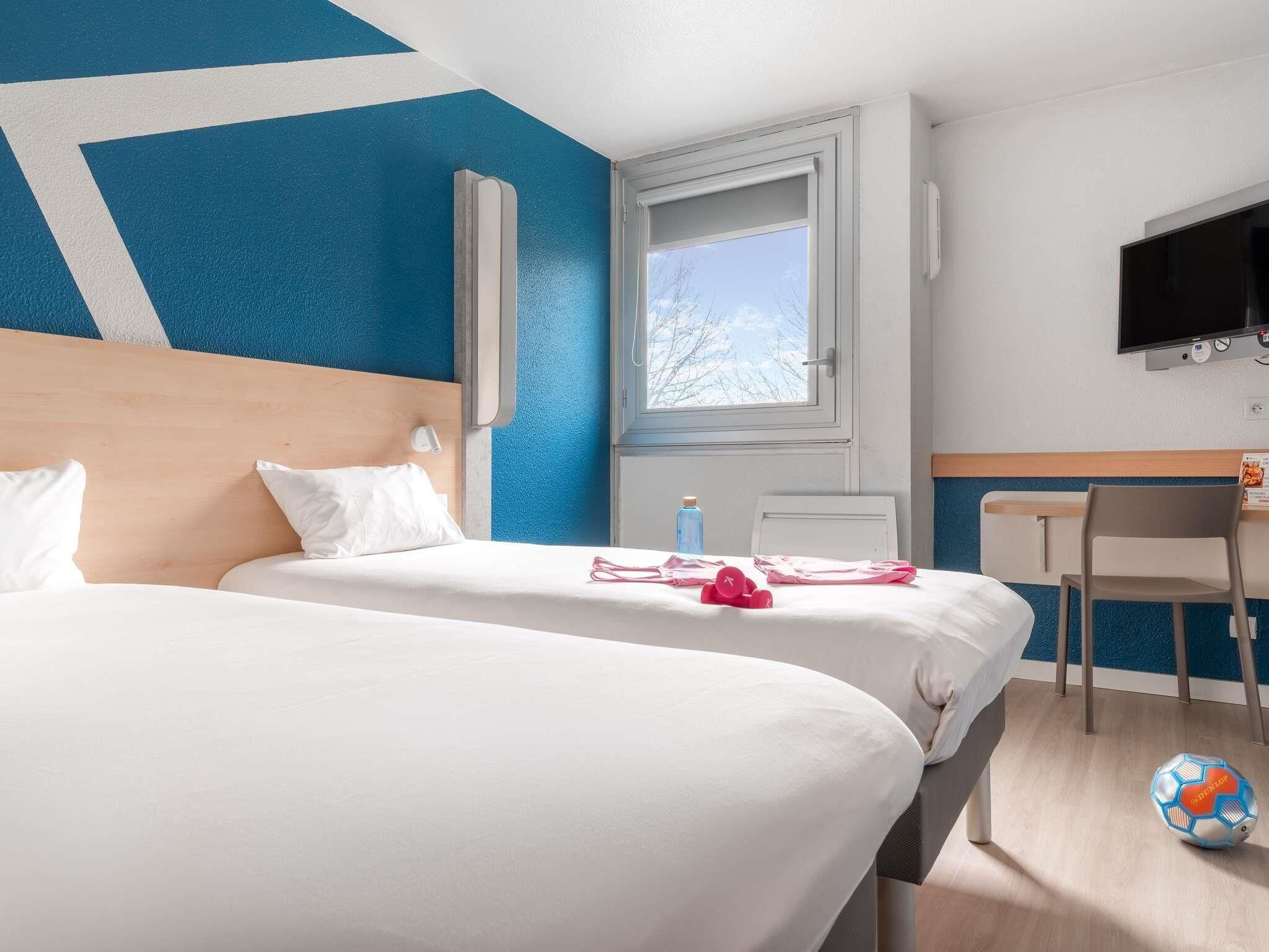 Zweibettzimmer, 2 Einzelbetten | Kostenloses WLAN, Bettwäsche