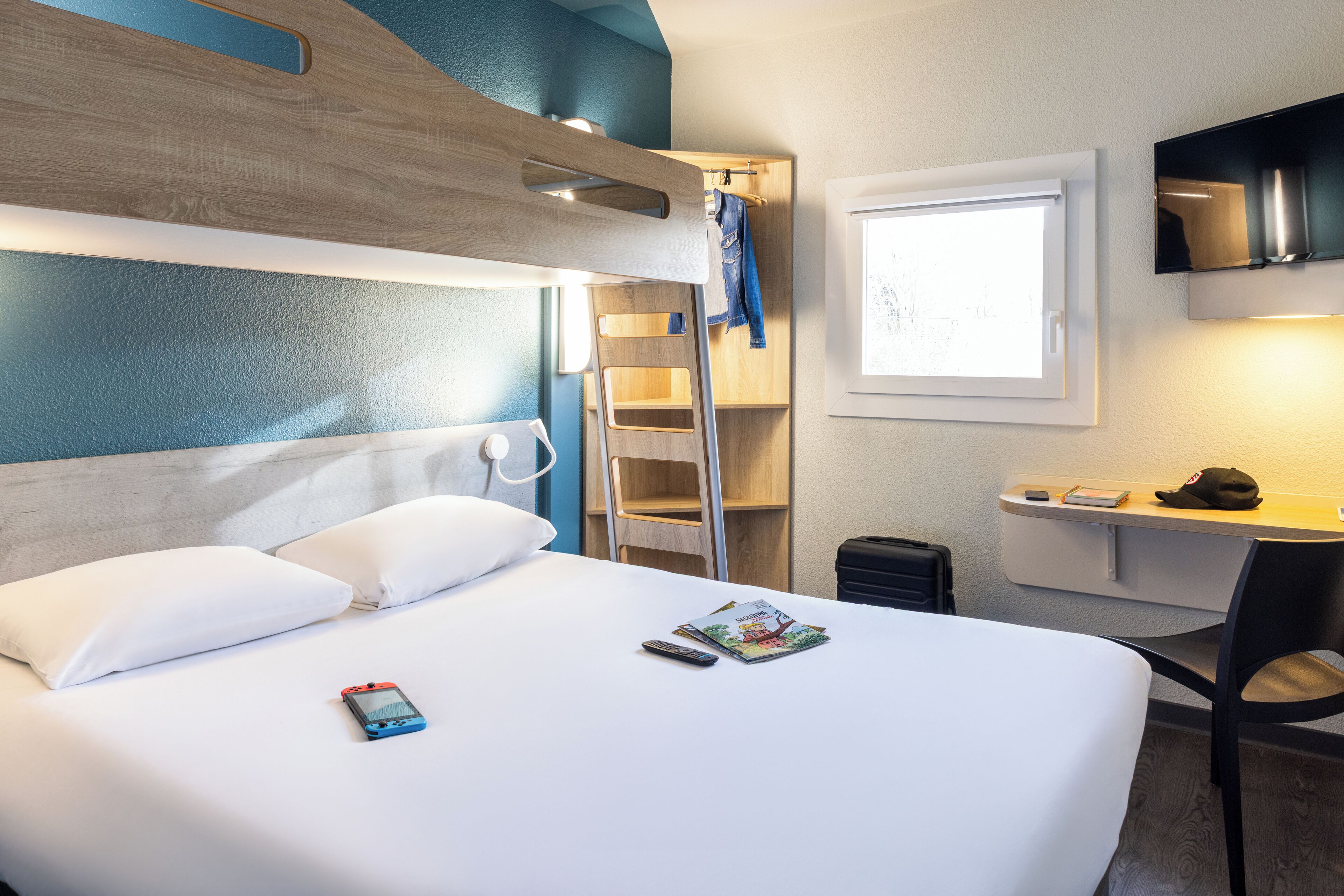 Habitación triple, varias camas | Escritorio, insonorización, cunas gratuitas y wifi gratis 