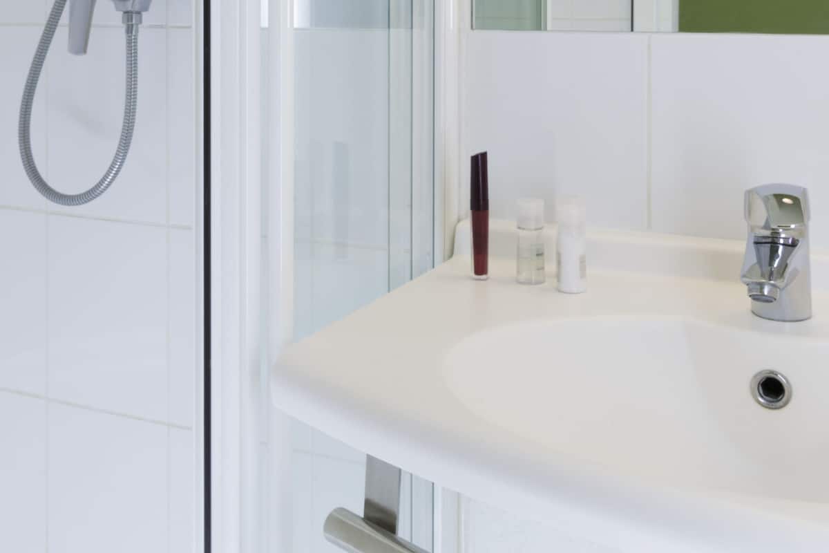 Shower, rainfall showerhead, eco-friendly toiletries, towels