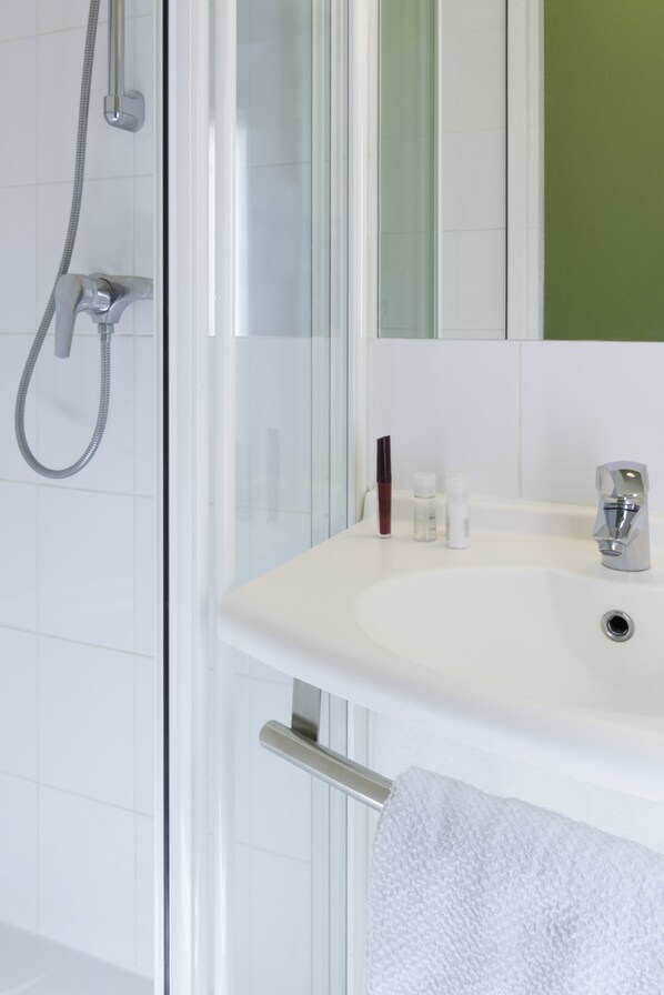 Shower, rainfall showerhead, eco-friendly toiletries, towels