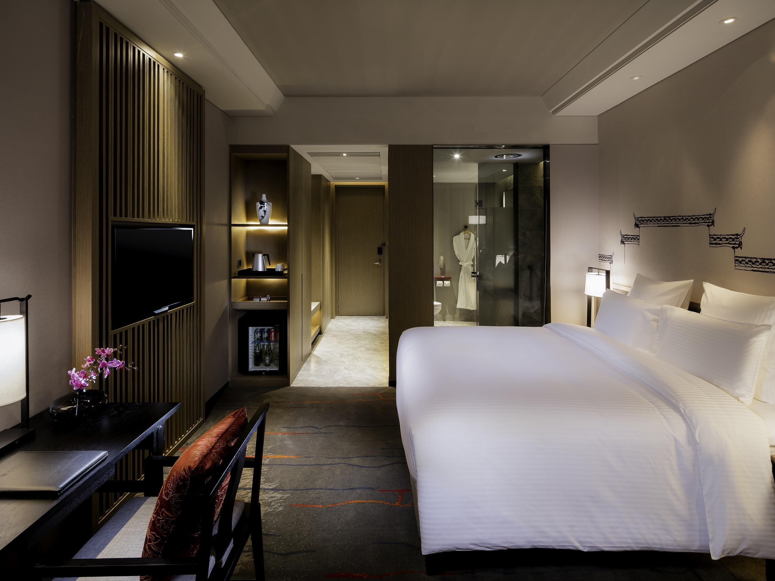 Ropa de cama de alta calidad y minibar 