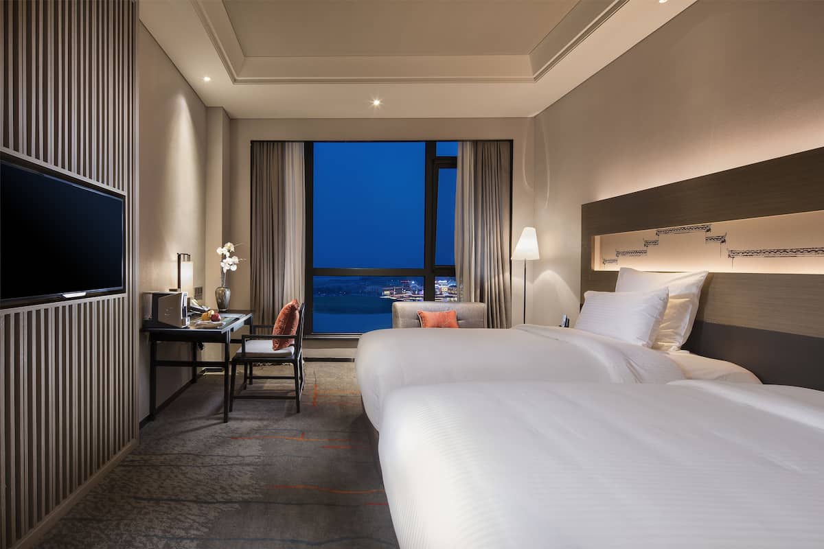 Ropa de cama de alta calidad y minibar