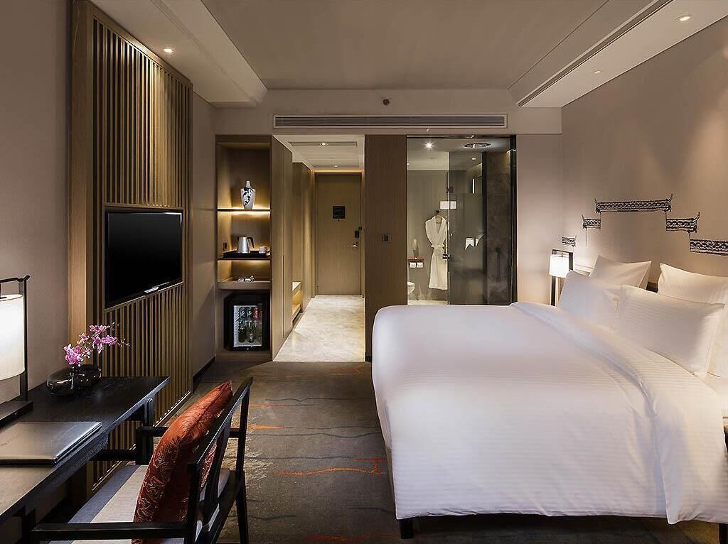 Ropa de cama de alta calidad y minibar 