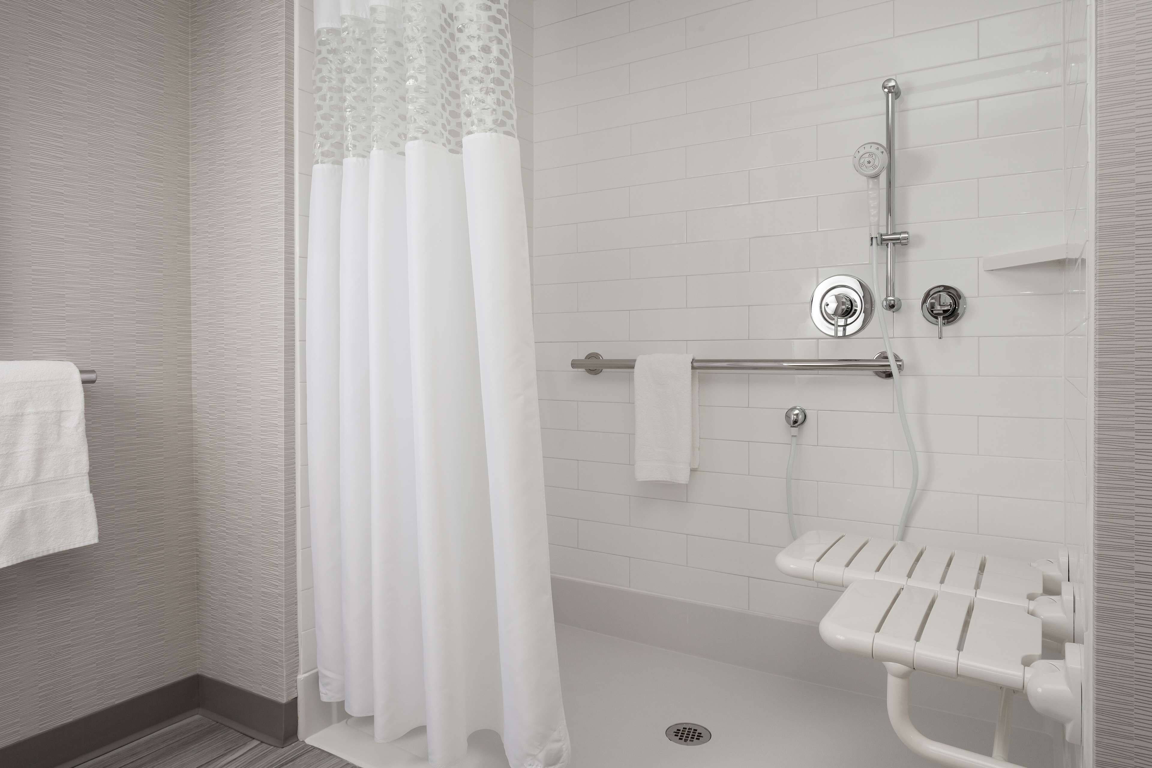 room, 1 king bed, accessible, non smoking (roll in shower) | bathroom | free toiletries, hair dryer, towels