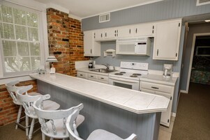 Family House, 5 Bedrooms, Courtyard Area | Private kitchen | Fridge, microwave, coffee/tea maker