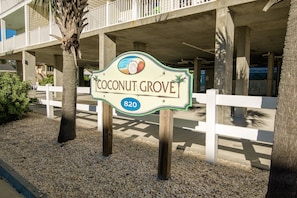 A sign for Coconut Grove with a number 820.