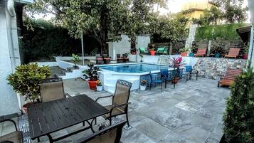 Outdoor pool, open 7 AM to 10 PM, sun loungers