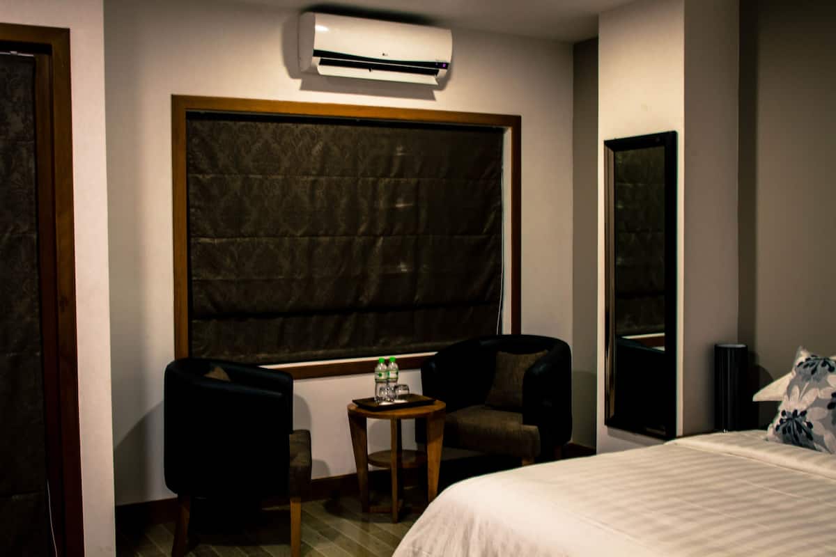 Suite Junior | Minibar, una cassaforte in camera, postazione laptop, tende oscuranti