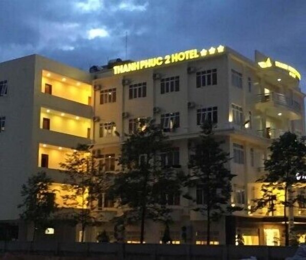 A multi-story building with the sign "THANH PHUC 2 HOTEL" at the top.