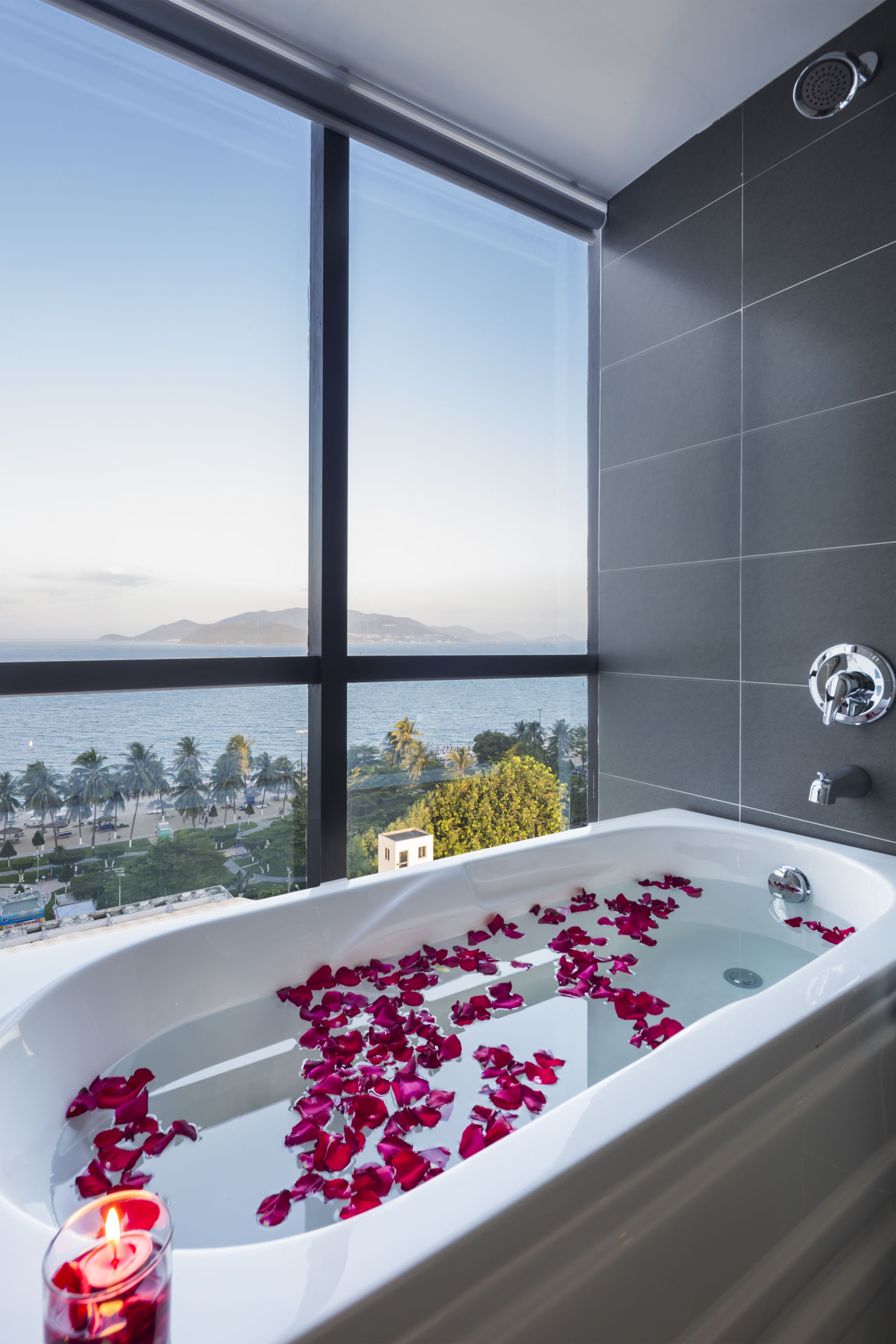 senior deluxe room | bathroom | shower, free toiletries, hair dryer, bathrobes