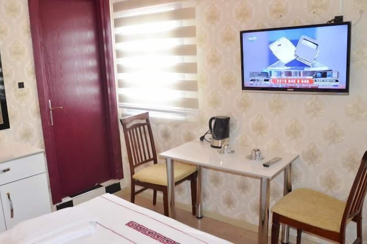 Habitación doble | Caja de seguridad en la habitación, escritorio y cunas gratuitas