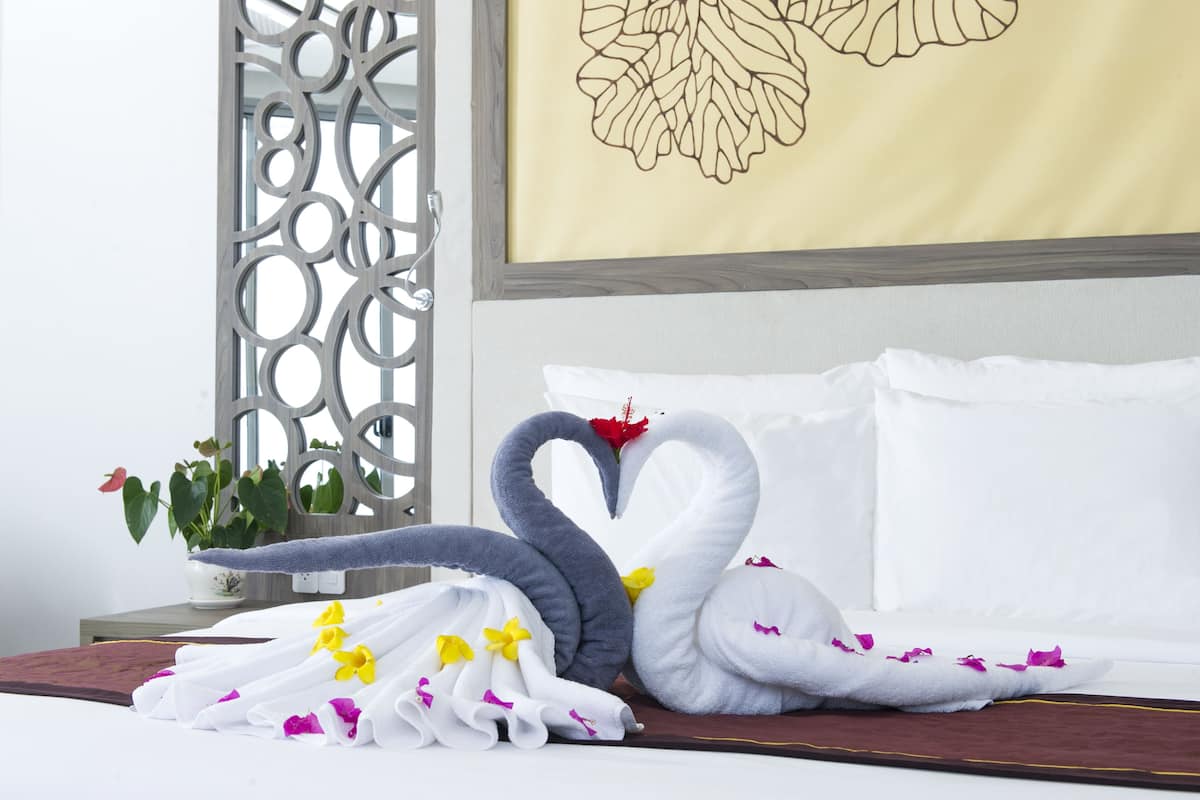 Luxury Suite, 1 King Bed, Ocean View | 1 bedroom, premium bedding, minibar, in-room safe