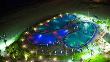 Outdoor pool, free cabanas, pool umbrellas