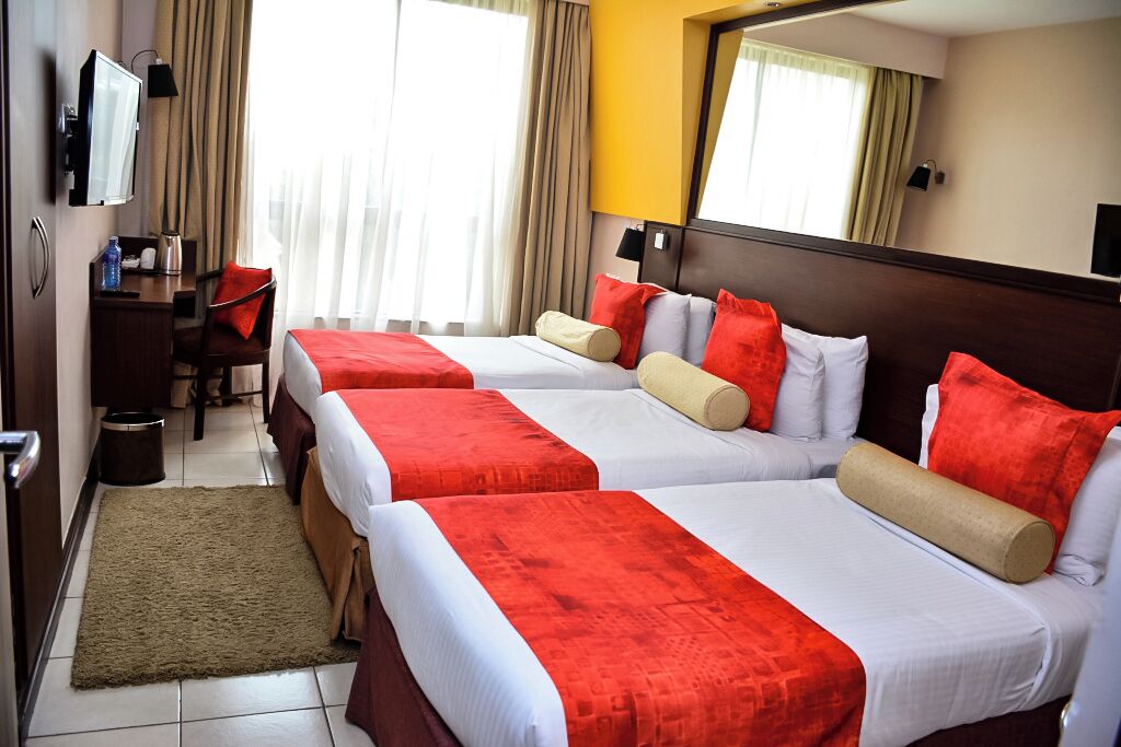 deluxe triple room | premium bedding, in-room safe, desk, blackout curtains