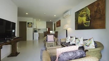 2 Bedrooms Apartment, Pool View | Living area | 32-inch LCD TV with cable channels, TV