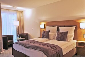 Premium bedding, in-room safe, desk, soundproofing