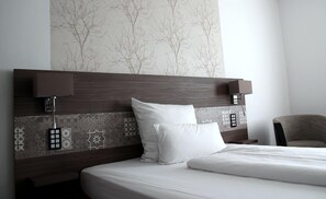 Premium bedding, in-room safe, desk, soundproofing