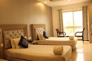 Deluxe Room | Premium bedding, minibar, in-room safe, desk