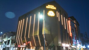 A hotel with a modern design, featuring a prominent sign for Hotel Shivani. - Treebo Shivani (Indore)