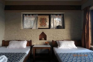 Desk, blackout drapes, rollaway beds